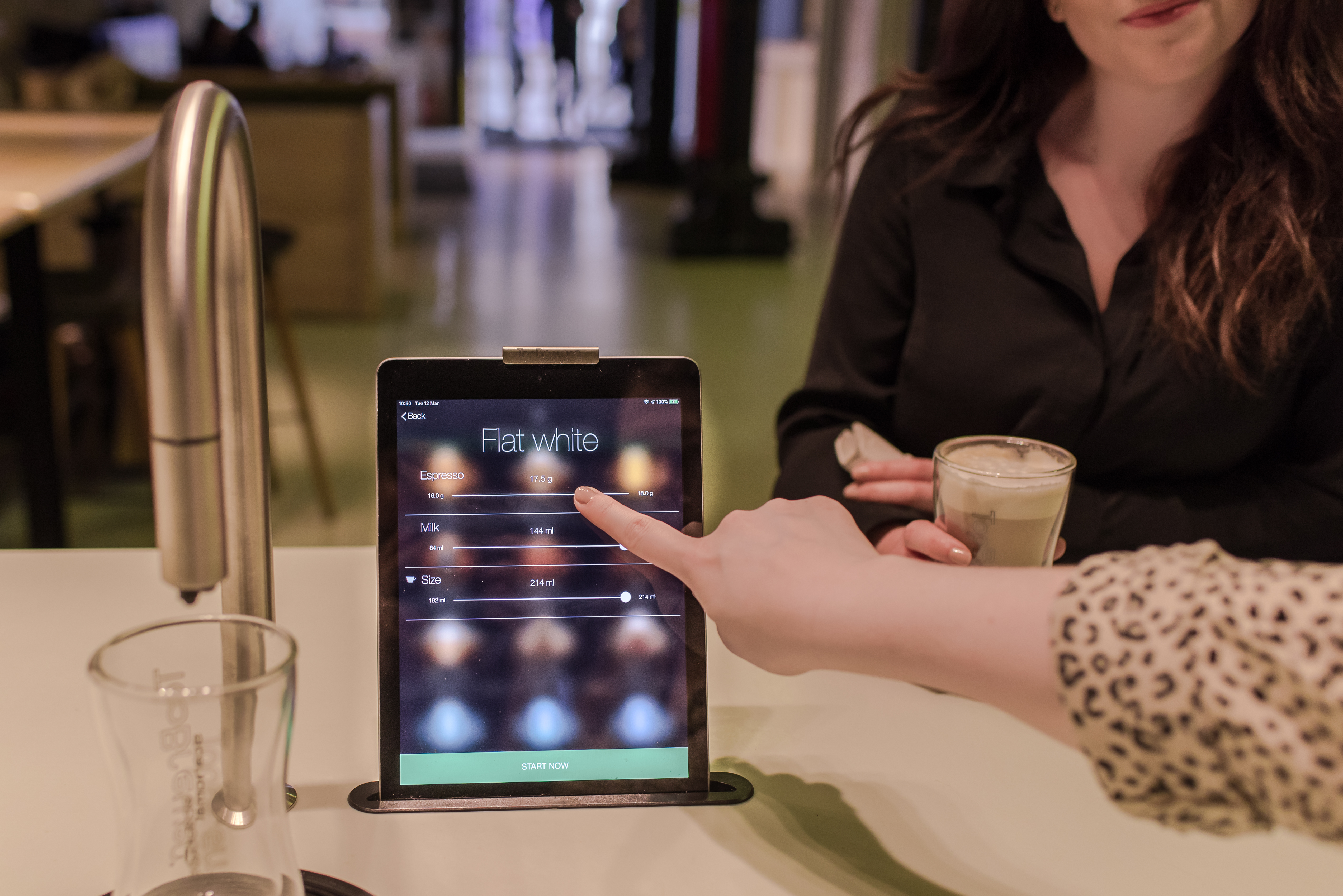 Space member making a selection on TopBrewer's integrated iPad