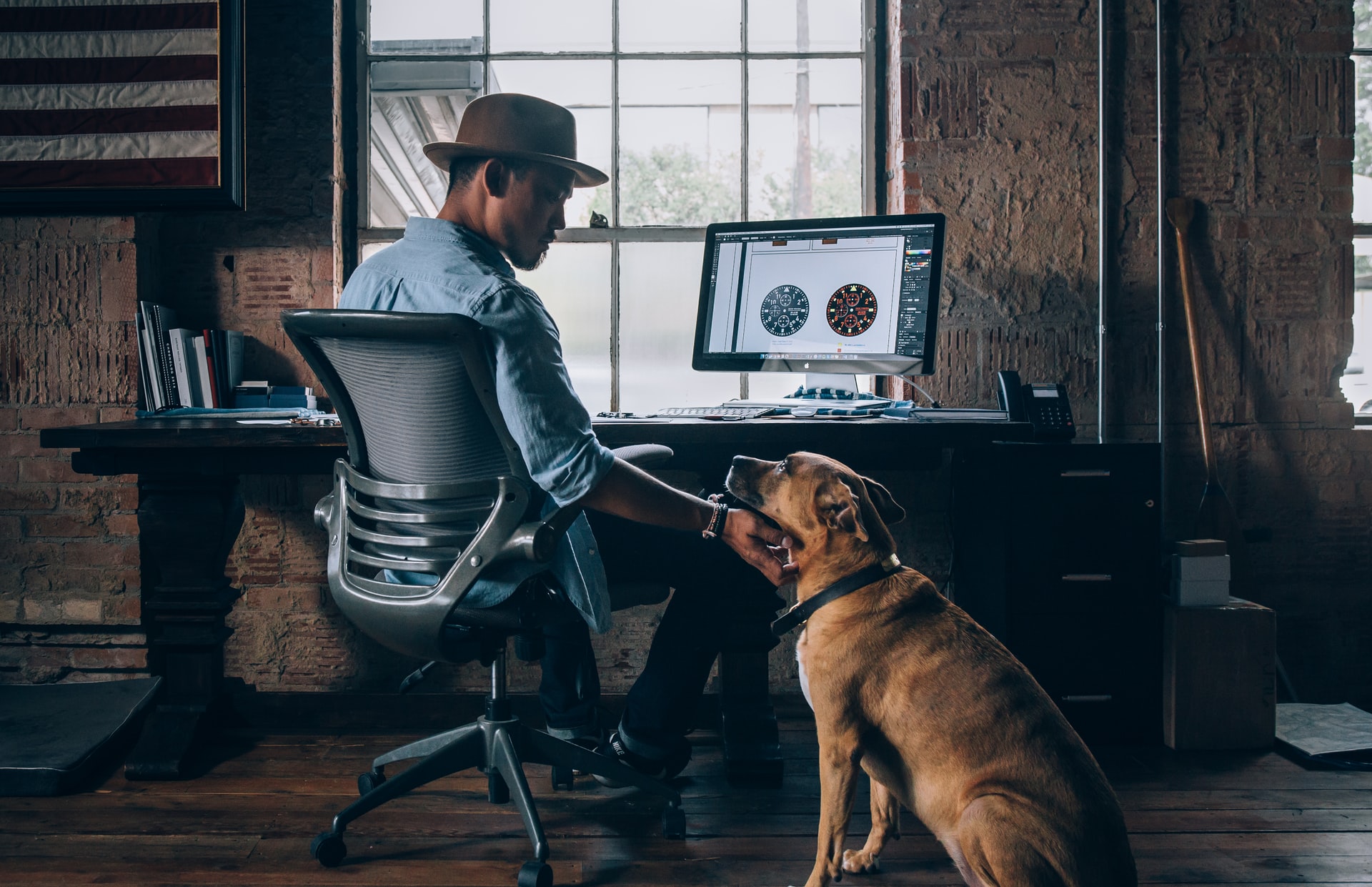 Allow dogs in the office. Photo via Unsplash