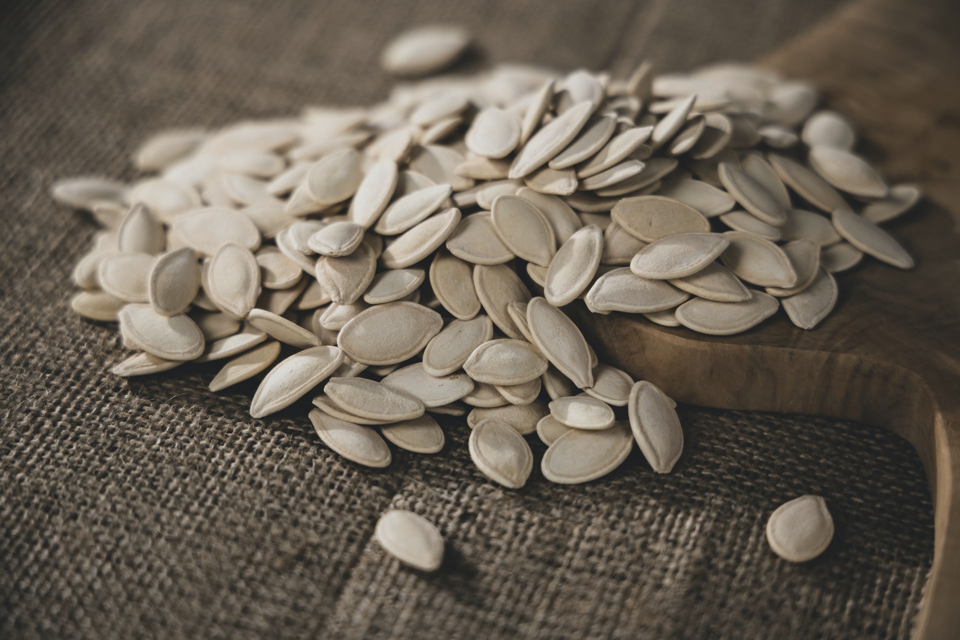 Pumpkin seeds are a good healthy alternative. Photo via Unsplash