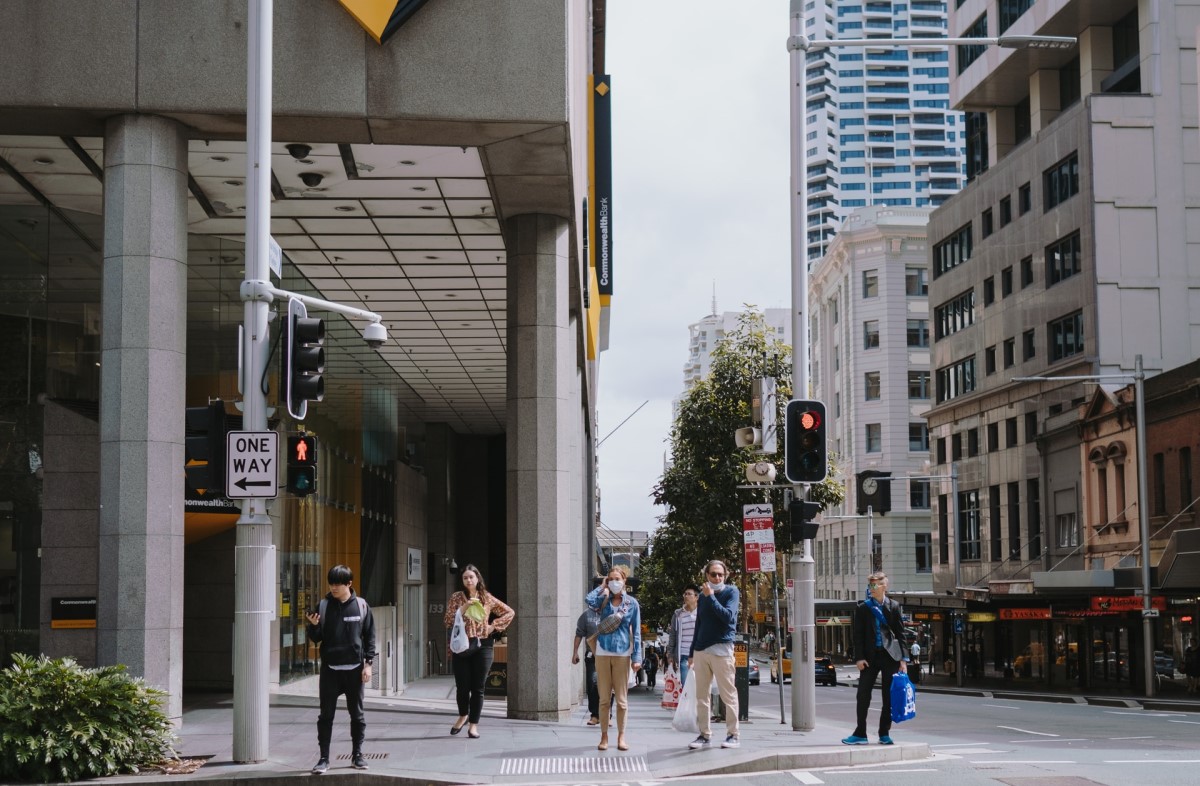 People walking through streets of Sydney - Credit to @katetrifo, image supplied via Unsplash